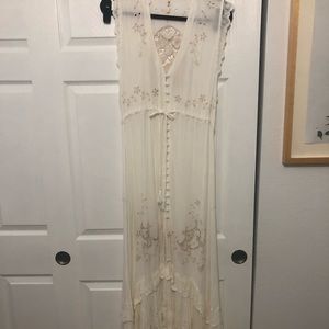Spell long white button front dress.